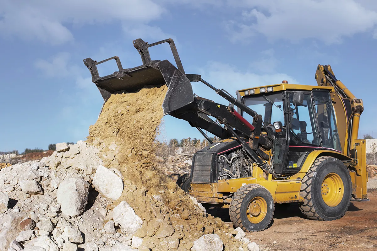 construction equipment engines used in loaders for moving soil and construction materials