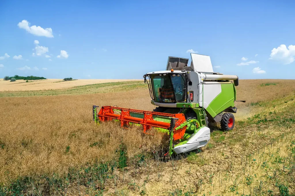 agricultural harvester engines powering combine harvesters in large scale farmland