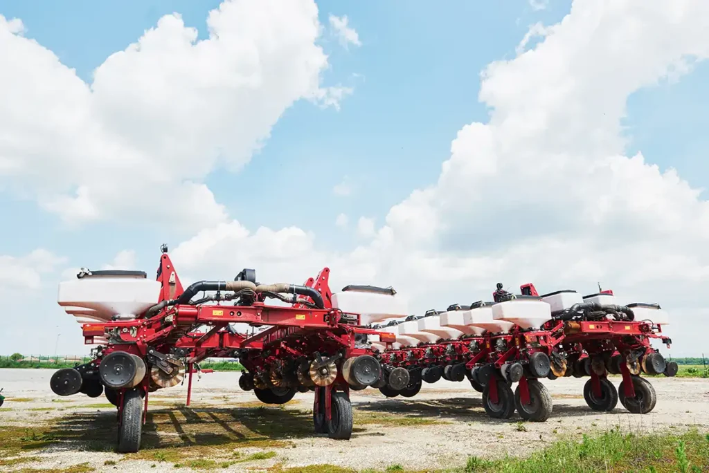 agricultural planting machinery engines powering large seeder equipment