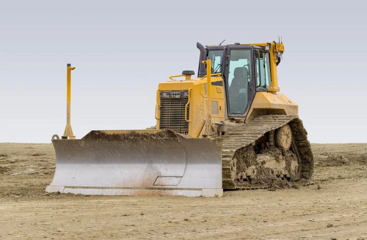 bulldozer engine powering heavy duty bulldozer on construction site