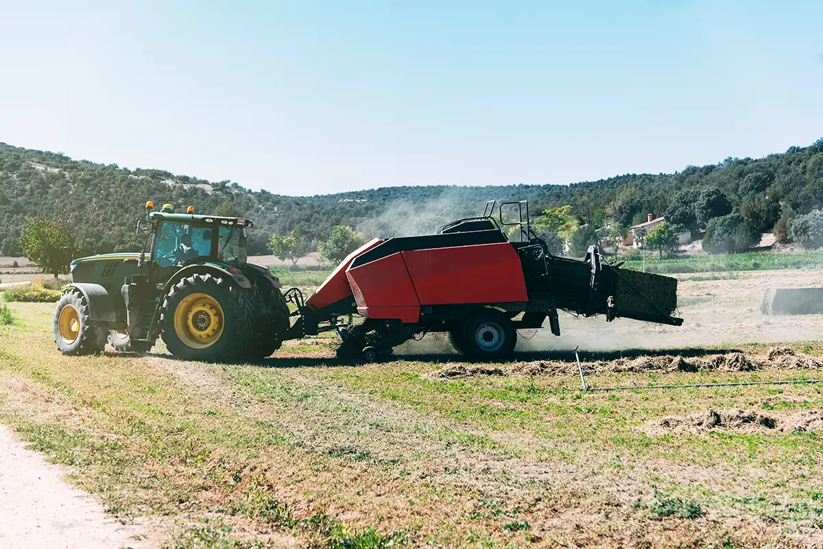 tractor diesel engines powering crop maintenance machinery in agricultural field