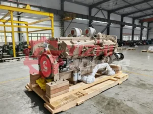 Genuine Cummins K50 engine assembly with heavy duty turbochargers on wooden pallet.