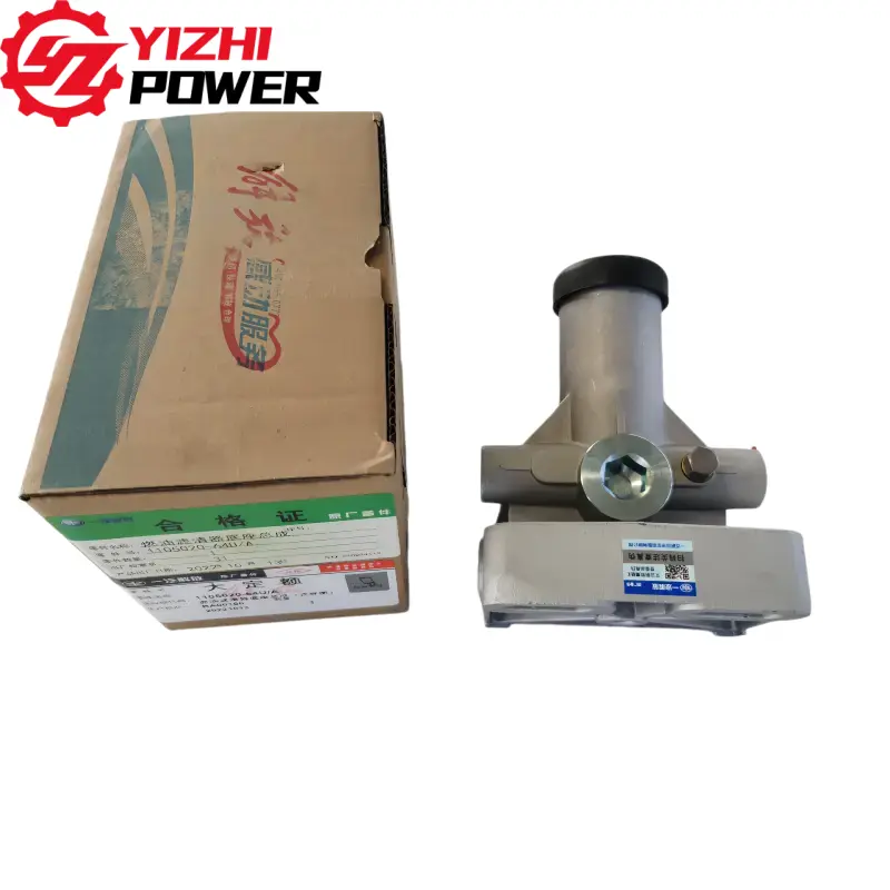 กล่องกระดาษแข็งติดฉลาก YIZHI POWER อยู่ข้างชิ้นส่วนโลหะคล้ายวาล์วไฮดรอลิกสีเทา มีฝาครอบสีดำและป้ายระบุข้อมูลสีน้ำเงิน